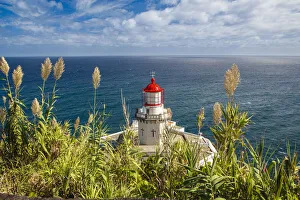 The Farol do Arnel Lighthouse at Ponta do Arnel near Nordeste, Sao Miguel Island, Azores The Farol do Arnel Lighthouse at Ponta do Arnel near Nordeste, Sao Miguel Island, Azores