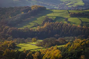 Fields and woods in Autumn near Stanage Edge, Peak District; Derbyshire, England, United Kingdom Fields and woods in Autumn near Stanage Edge, Peak District; Derbyshire, England, United Kingdom