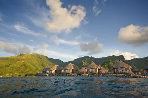 French Polynesia, Moorea Lagoon Resort, Bungalows Over Beautiful Turquoise Ocean French Polynesia, Moorea Lagoon Resort, Bungalows Over Beautiful Turquoise Ocean