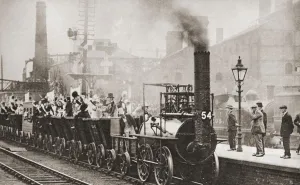 George Stephenson's railway engine making the journey from Stockton to Darlington in 1925 to mark its hundred years George Stephenson's railway engine making the journey from Stockton to Darlington in 1925 to mark its hundred years