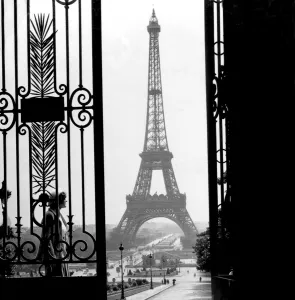 Historic image in black and white of the Eiffel Tower in Paris, France circa 1920; Paris, France Historic image in black and white of the Eiffel Tower in Paris, France circa 1920; Paris, France