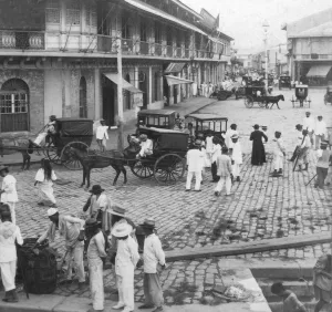 Historic image in black and white of people on the cobblestone street in Binondo, a Chinatown district in Manila Historic image in black and white of people on the cobblestone street in Binondo, a Chinatown district in Manila
