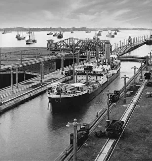 Historic image in black and white of a steamer ship in the Gatun locks, Panama Canal; Panama Historic image in black and white of a steamer ship in the Gatun locks, Panama Canal; Panama