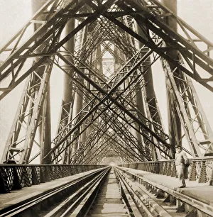 Historic image in sepia of the railway tracks on Forth Bridge, a cantilever railway bridge across the Firth of Forth Historic image in sepia of the railway tracks on Forth Bridge, a cantilever railway bridge across the Firth of Forth