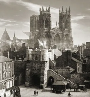 Historic image in sepia of York Minster Cathedral in the background and a typical victorian street scene with Historic image in sepia of York Minster Cathedral in the background and a typical victorian street scene with