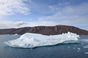 Iceberg and Mountain, Rode Fjord, Scoresby Sund, Greenland Iceberg and Mountain, Rode Fjord, Scoresby Sund, Greenland