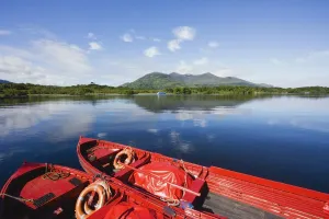 Killarney, County Kerry, Munster, Ireland; Two Boats In The Water Killarney, County Kerry, Munster, Ireland; Two Boats In The Water