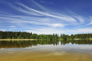 Landscape and Sky Reflected in Lake Hegratsried in Spring, Hegratsried, Halblech, Swabia, Bavaria, Germany Landscape and Sky Reflected in Lake Hegratsried in Spring, Hegratsried, Halblech, Swabia, Bavaria, Germany