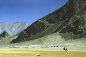 Local Horsemen In Pamirs Mountains, Xinjiang, China Local Horsemen In Pamirs Mountains, Xinjiang, China