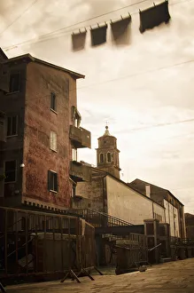 Long Exposure Of Clothing Drying On A Clothesline Moving In The Breeze In The Castello District; Venice, Italy Long Exposure Of Clothing Drying On A Clothesline Moving In The Breeze In The Castello District; Venice, Italy