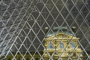 Looking Out Of The Pyramid To The Louvre Museum At Night, Paris, France Looking Out Of The Pyramid To The Louvre Museum At Night, Paris, France