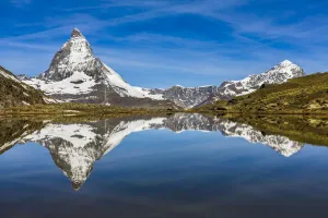 The Matterhorn reflected in Riffelsee Lake at Zermatt, Switzerland The Matterhorn reflected in Riffelsee Lake at Zermatt, Switzerland