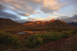 Morning Sunlight Lighting Up Mount Adney And Fall Colours Along The Dempster Highway, Yukon Morning Sunlight Lighting Up Mount Adney And Fall Colours Along The Dempster Highway, Yukon