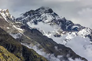 Mountain tops and mist in the Pennine Alps at Zermatt in Switzerland Mountain tops and mist in the Pennine Alps at Zermatt in Switzerland