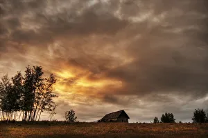 An Old Abandoned Homestead On A Hill During A Fall Sunset North Of Bon Accord, Alberta An Old Abandoned Homestead On A Hill During A Fall Sunset North Of Bon Accord, Alberta