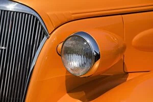 Images Dated 1st August 2010: Orange Painted Vintage Cars Headlight And Front Grill; Port Colborne, Ontario, Canada