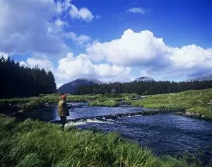 Images Dated 20th March 2007: Side Profile Of A Man Fly-Fishing In A River, Connemara, County Galway, Republic Of Ireland
