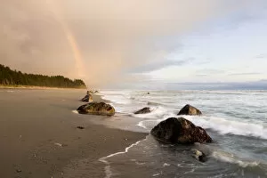Images Dated 28th September 2008: A Rainbow Glows In Storm Clouds Over A Beach And Coastline; Alaska, United States Of America