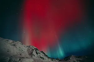 Red Aurora Over Talkeetna Mountains At Hatcher Pass In Southcentral, Alaska Red Aurora Over Talkeetna Mountains At Hatcher Pass In Southcentral, Alaska