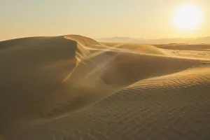 Rippled sand dunes in sunset light, Ebro River Delta; Catalonia, Spain Rippled sand dunes in sunset light, Ebro River Delta; Catalonia, Spain
