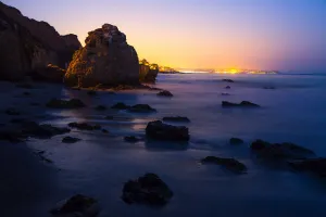 Rock formations along El Matador state beach at night near Los Angeles, Malibu, California, USA Rock formations along El Matador state beach at night near Los Angeles, Malibu, California, USA