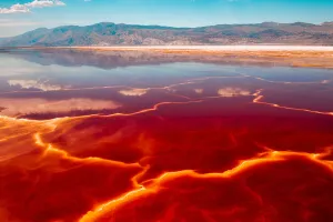 Salt loving halobacteria turns a shallow lake bed red, Lone Pine, California, USA Salt loving halobacteria turns a shallow lake bed red, Lone Pine, California, USA