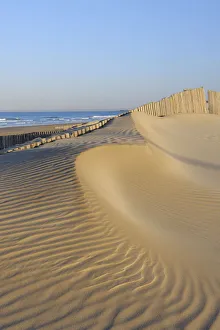 Sand Fence at Beach near Cadiz, Costa De La Luz, Cadiz Province, Andalusia, Spain Sand Fence at Beach near Cadiz, Costa De La Luz, Cadiz Province, Andalusia, Spain