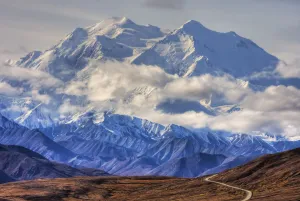 Scenic View Of Mt. Mckinley With Colorful Autumn Tundra And The Park Road In The Foreground, Denali National Park Scenic View Of Mt. Mckinley With Colorful Autumn Tundra And The Park Road In The Foreground, Denali National Park