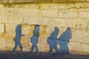 Images Dated 20th March 2009: Shadows Of Pedestrians Cast On A Wall; Paris, France