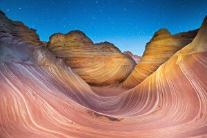 Nature and Landscapes Gallery: A shooting star passes over the Wave sandstone rock formation, located in Coyote Buttes North