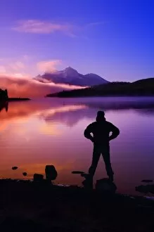Images Dated 4th October 2006: Silhouette Of A Man At A Mountain Lake