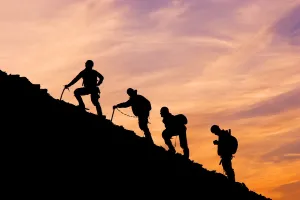 Silhouette Of Four Mountian Climbers As They Ascend Mount Ascension Before Sunrise Lost Lake Seward Alaska Kenai Silhouette Of Four Mountian Climbers As They Ascend Mount Ascension Before Sunrise Lost Lake Seward Alaska Kenai