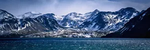 Snowy Mountains In Sunshine Beside Blue Sea; Antarctica Snowy Mountains In Sunshine Beside Blue Sea; Antarctica