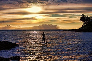 Boarder Collection: Stand-up Paddle boarder at sunset