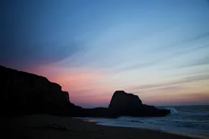 The sun sets over Panther Beach in Central California The sun sets over Panther Beach in Central California