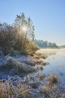 Nature and Landscapes Gallery: Sunrise at a frozen reservoir lake at Rettenbach in the Bavarian Forest, Bavaria, Germany