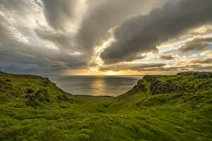 Sunset over the Atlantic Ocean which dramatic clouds, Snaefellsness Peninsula; Iceland