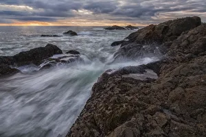 Sunset Over Ocean At Sunset And High Tide; Ucluelet Vancouver Island British Columbia Canada Sunset Over Ocean At Sunset And High Tide; Ucluelet Vancouver Island British Columbia Canada