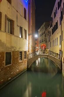 Light Painting Gallery: A Tranquil Canal Between Buildings With A Heart Shape On A Footbridge; Venice, Veneto, Italy
