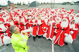 Images Dated 14th October 1993: 100 Father Christmas s, Photocall to open new multi storey carpark at Lakeside