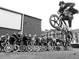 15 year old Martin Brunning in action on a BMX watched by
