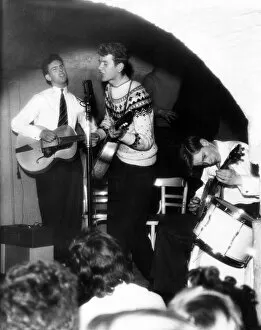 00611 Gallery: 18 year old Colin Rimmer of Holylake singing with the Coney Island Skiffle Group in The