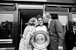 Images Dated 2nd July 1971: 1971 Wimbledon Ladies Singles Final. Champion Evonne Goolagong gets a kiss from her