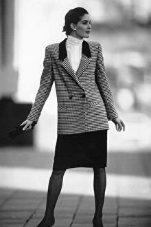 1980s Women, s Fashion: Our model wears Check double breasted jacket with black skirt