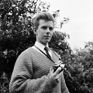 Flying Saucers Gallery: 23 year old Gordon Faulkner in his garden, holding the camera with which he photographed