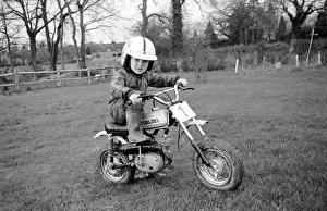 4 years old Jan Dixon on his mino motor bike. December 1974 74-7664-008 4 years old Jan Dixon on his mino motor bike. December 1974 74-7664-008