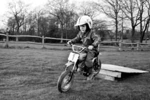 4 years old Jan Dixon on his mino motor bike. December 1974 74-7664 4 years old Jan Dixon on his mino motor bike. December 1974 74-7664