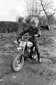 4 years old Jan Dixon on his mino motor bike. December 1974 74-7664-002