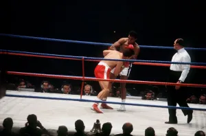 Action during the heavyweight world title fight between Muhammad Ali Action during the heavyweight world title fight between Muhammad Ali