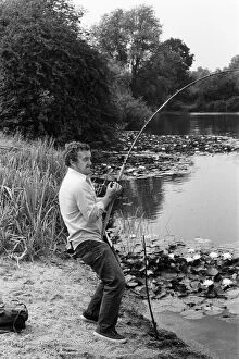 Images Dated 5th August 1970: Actor Bernard Cribbins today went fishing near Shepperton